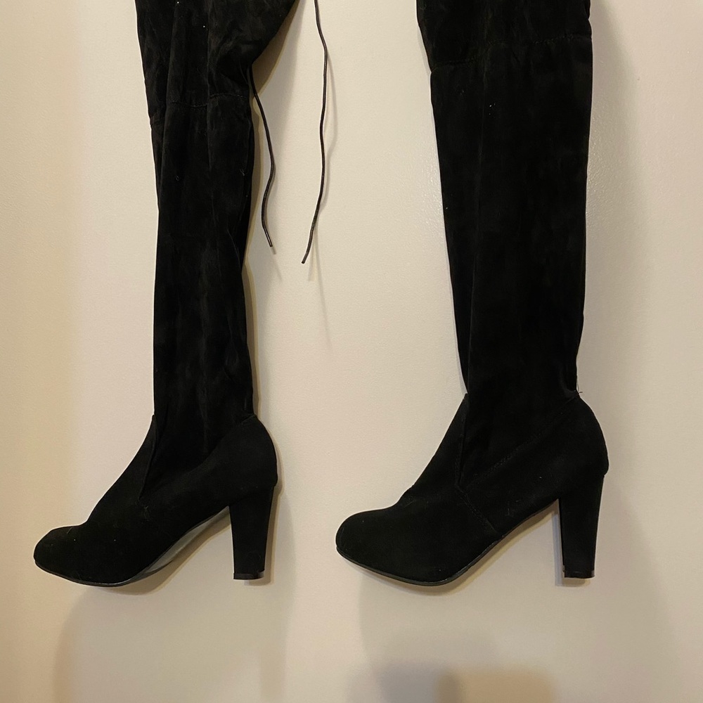 Knee high tie up boots